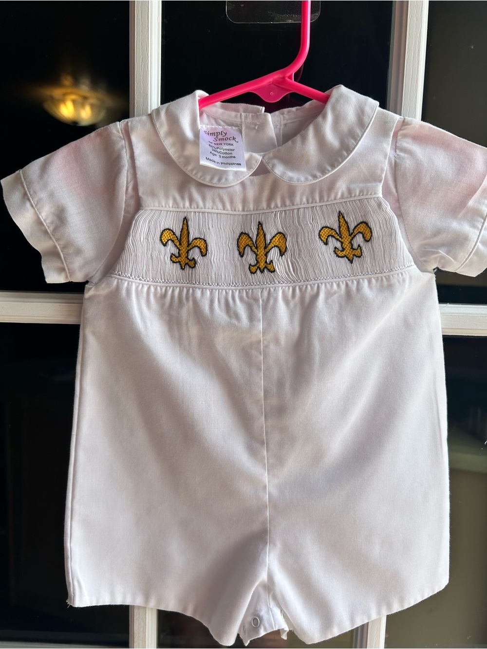 White Baby One-Piece with Yellow Fleur-de-Lis Embroidery by
